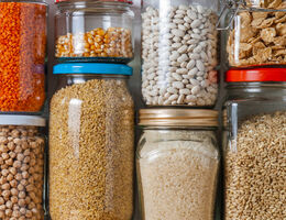Jars of dried beans, corn and cereals.